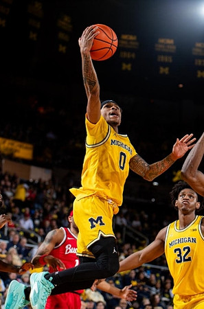Dug McDaniel (0) and Tarris Reed Jr. (32)