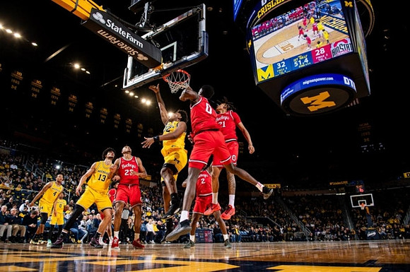 Nimari Burnett (4), Dug McDaniel (0), Olivier Nkamhoua (13), and Tarris Reed Jr. (32)