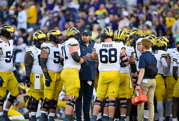 Grant Newsome and Michigan Team