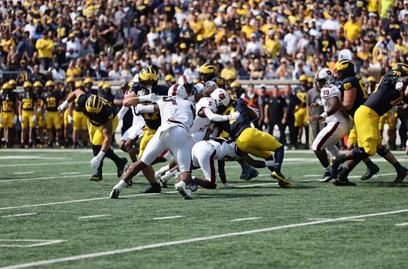 Donovan Edwards (7), Josh Priebe (68), and Myles Hinton (78)