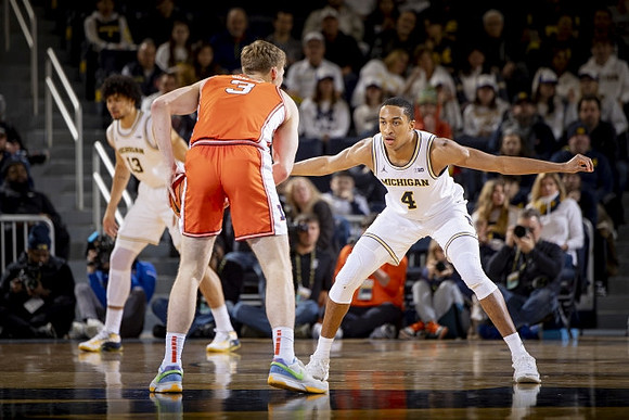 Olivier Nkamhoua (13) and Nimari Burnett (4)