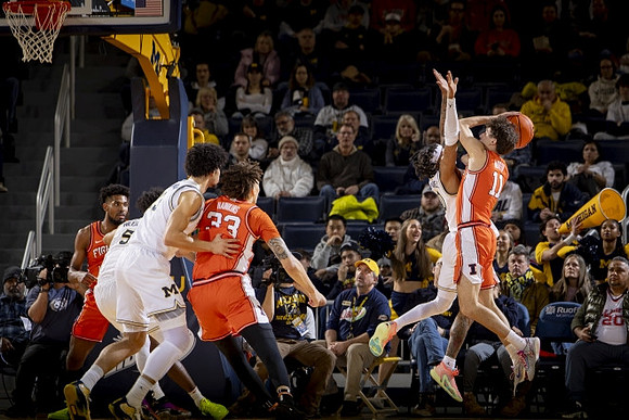 Nimari Burnett (4), Olivier Nkamhoua (13), and Dug McDaniel (0)
