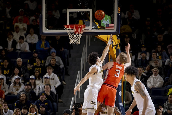 Olivier Nkamhoua (13) and Terrance Williams II (5)