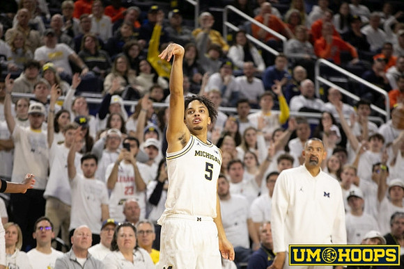 Terrance Williams II (5) and Juwan Howard