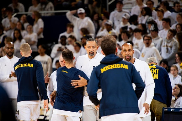 Juwan Howard, Saddi Washington, and Michigan Team