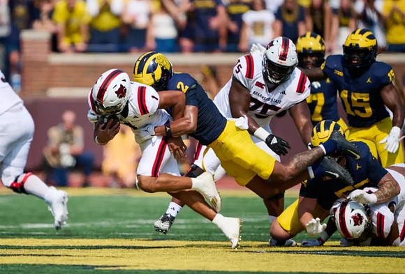 Will Johnson (2), Makari Paige (7), Ernest Hausmann (15), and Mason Graham (55)
