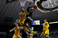 Will Tschetter (42), Olivier Nkamhoua (13), and Jaelin Llewellyn (3)