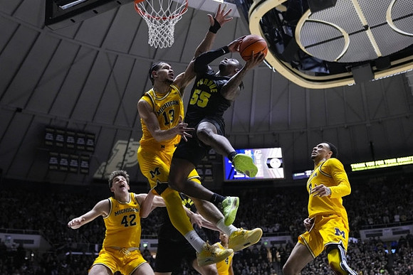 Will Tschetter (42), Olivier Nkamhoua (13), and Jaelin Llewellyn (3)
