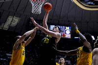 Olivier Nkamhoua (13), Jaelin Llewellyn (3), and Tarris Reed Jr. (32)