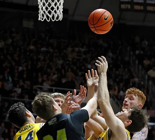 Youssef Khayat (24), Ian Burns (14), and Harrison Hochberg (31)