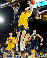 Jaelin Llewellyn (3), Olivier Nkamhoua (13), and Dug McDaniel (0)