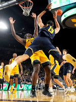 Olivier Nkamhoua (13) and Will Tschetter (42)