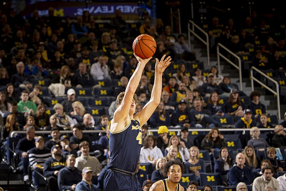 Will Tschetter (42) and Terrance Williams II (5)