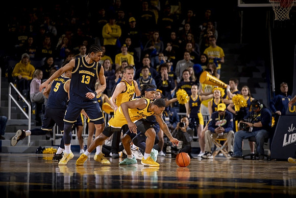 Terrance Williams II (5) and Olivier Nkamhoua (13)