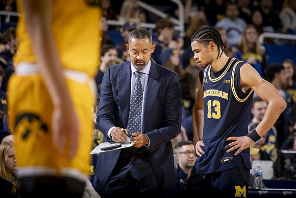 Juwan Howard and Olivier Nkamhoua (13)