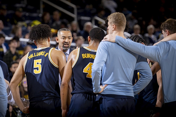Juwan Howard and Michigan Team