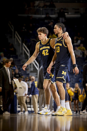 Will Tschetter (42) and Olivier Nkamhoua (13)