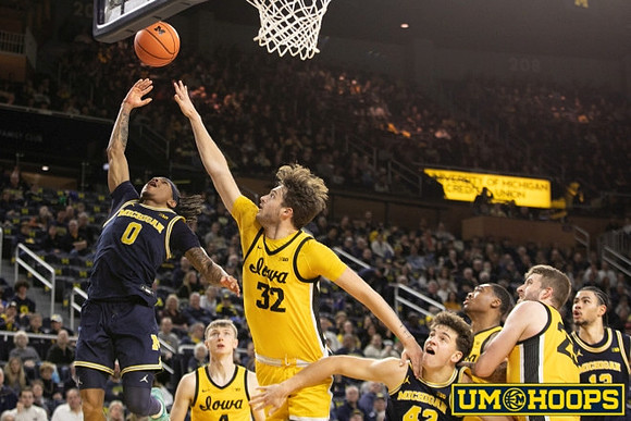 Dug McDaniel (0), Will Tschetter (42), and Olivier Nkamhoua (13)
