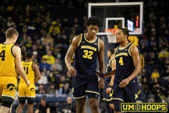 Tarris Reed Jr. (32) and Nimari Burnett (4)