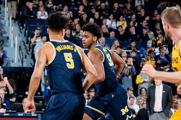 Terrance Williams II (5) and Tarris Reed Jr. (32)