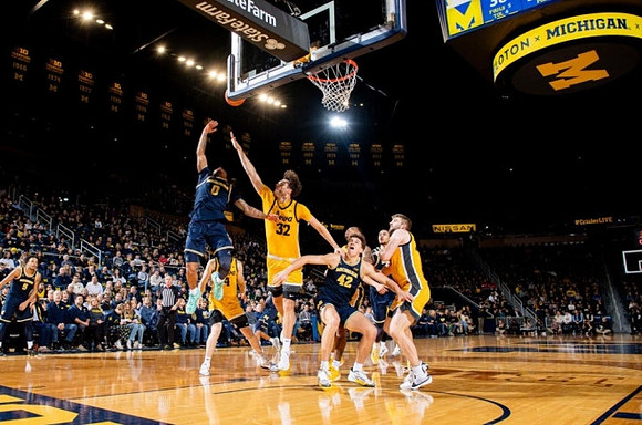 Dug McDaniel (0) and Will Tschetter (42)