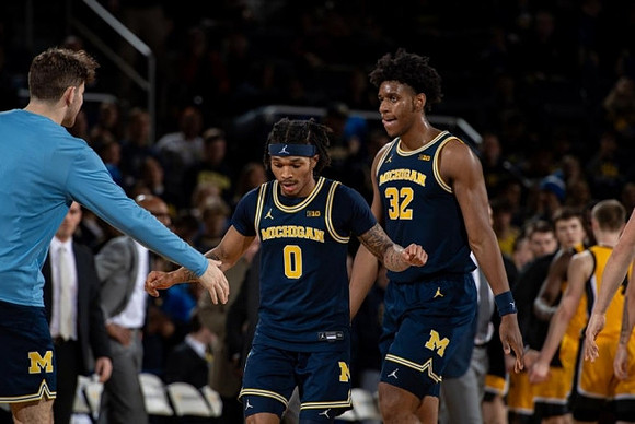 Dug McDaniel (0) and Tarris Reed Jr. (32)