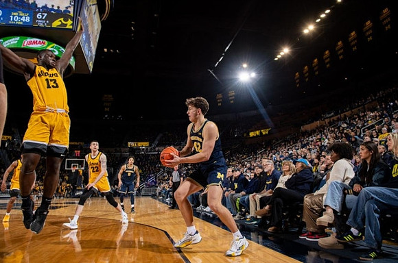 Terrance Williams II (5) and Will Tschetter (42)