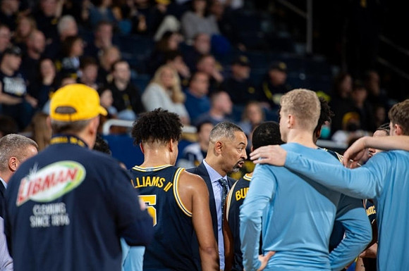 Juwan Howard and Michigan Team