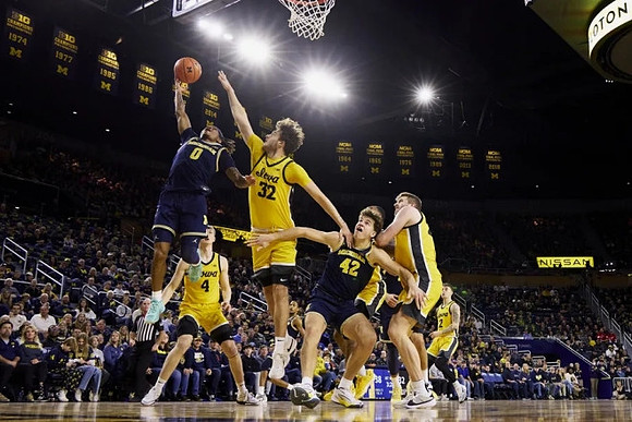 Dug McDaniel (0) and Will Tschetter (42)