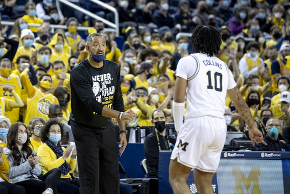 Juwan Howard and Frankie Collins (10)