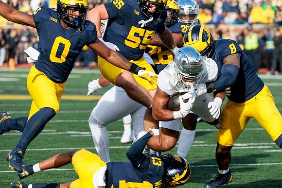 Josaiah Stewart (0), Mason Graham (55), Wesley Walker (13), Rayshaun Benny (26), and Derrick Moore (8)