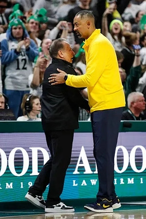 Michigan State Head Coach Tom Izzo and Juwan Howard