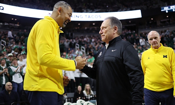 Juwan Howard, Michigan State Head Coach Tom Izzo, and Phil Martelli
