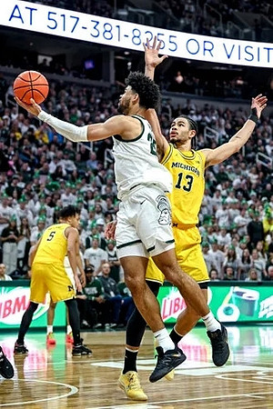 Jaelin Llewellyn (3) and Olivier Nkamhoua (13)