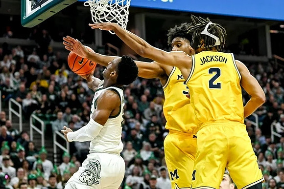 Tarris Reed Jr. (32) and Tray Jackson (2)