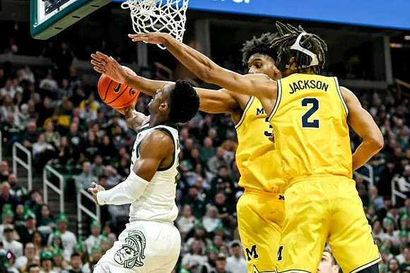 Tarris Reed Jr. (32) and Tray Jackson (2)