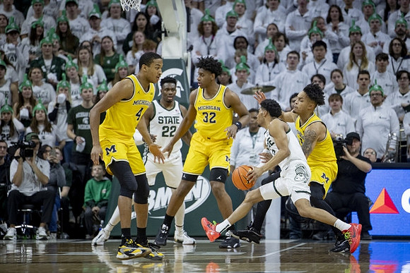 Nimari Burnett (4), Tarris Reed Jr. (32), and Terrance Williams II (5)