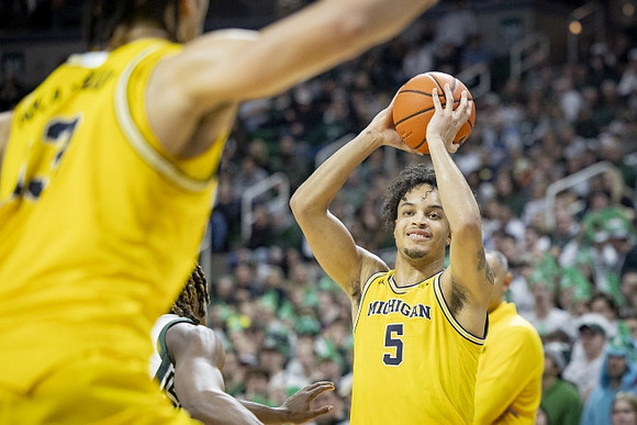 Jaelin Llewellyn (3) and Terrance Williams II (5)