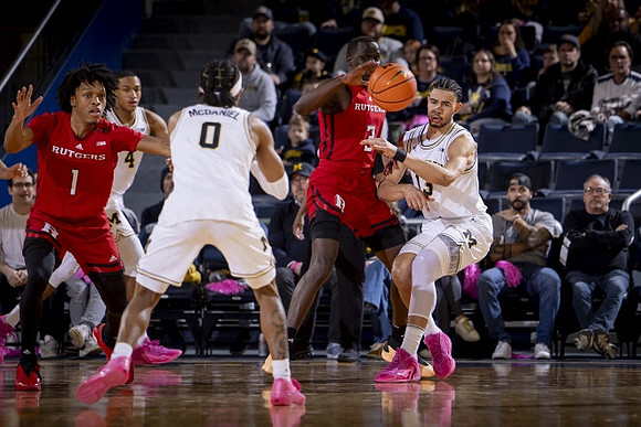 Nimari Burnett (4), Dug McDaniel (0), and Olivier Nkamhoua (13)