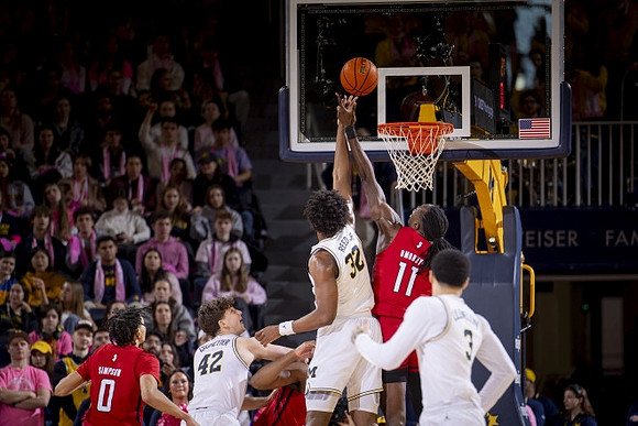 Will Tschetter (42), Tarris Reed Jr. (32), Jaelin Llewellyn (3), and Dug McDaniel (0)