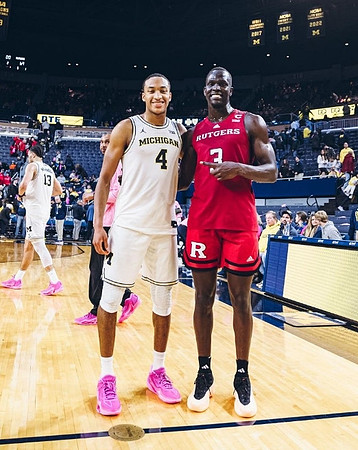 Olivier Nkamhoua (13) and Nimari Burnett (4)