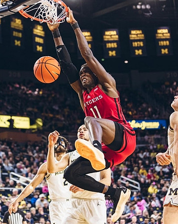 Tray Jackson (2), Olivier Nkamhoua (13), and Will Tschetter (42)