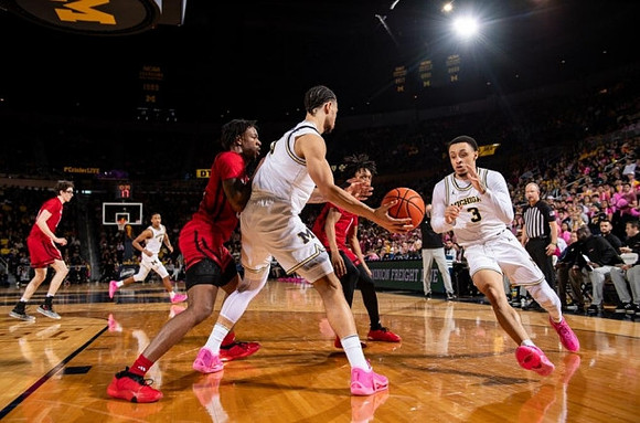 Nimari Burnett (4), Olivier Nkamhoua (13), and Jaelin Llewellyn (3)