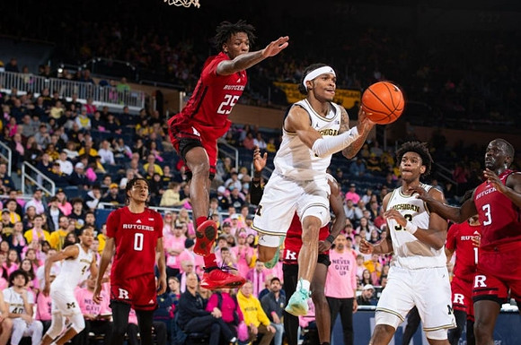 Nimari Burnett (4), Dug McDaniel (0), and Tarris Reed Jr. (32)