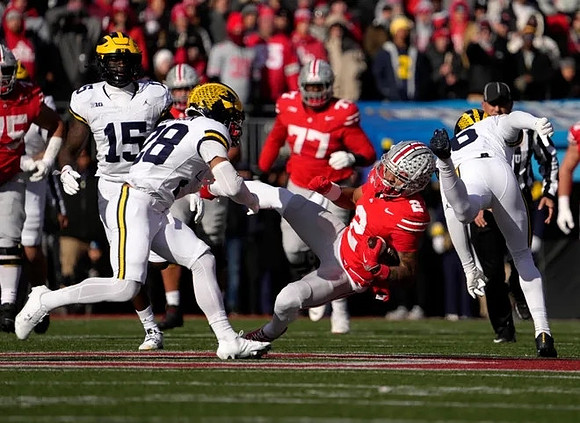 Ernest Hausmann (15), Quinten Johnson (28), and Brandyn Hillman (6)