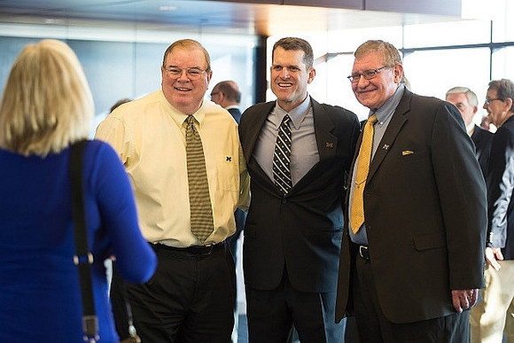 Jim Brandstatter, Jim Harbaugh, and Jon Falk