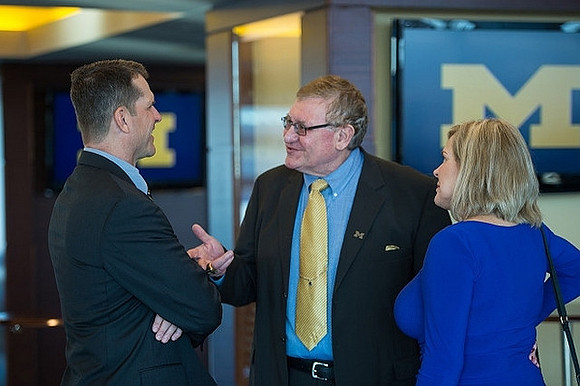 Jim Harbaugh and Jon Falk