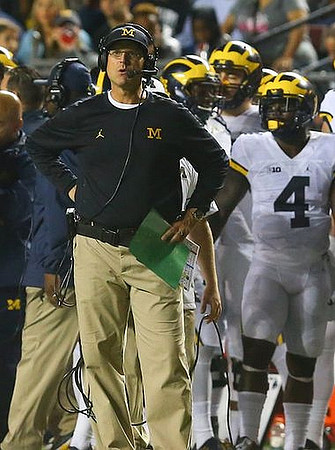 Jim Harbaugh and De'Veon Smith (4)