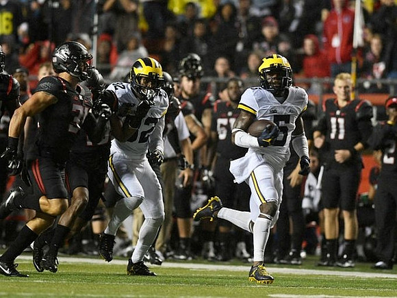 Ty Isaac (32) and Jabrill Peppers (5)