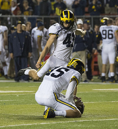 Ryan Tice (41) and Garrett Moores (15)